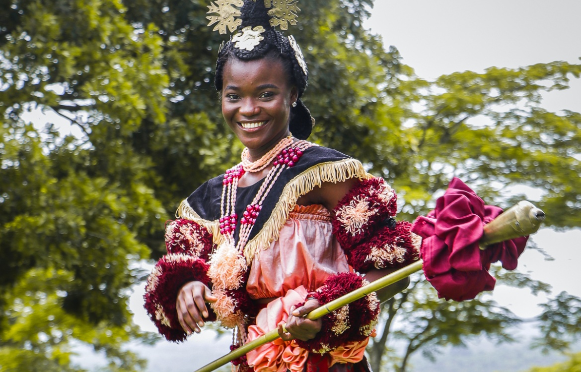 A maiden adorned in cultural attire from a visitor on her budget-friendly trip to Calabar.