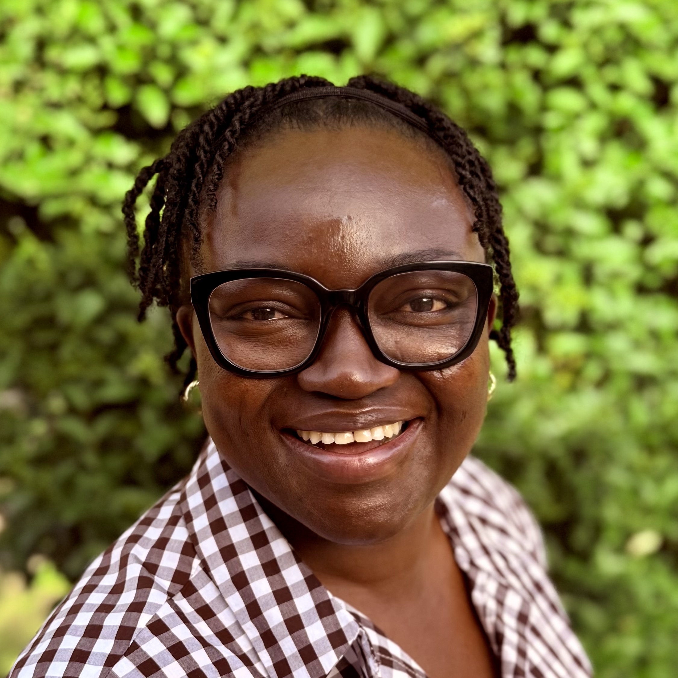 Dr. Iroro Tanshi conducting field research in Nigerian forests, tracking bats and monitoring biodiversity