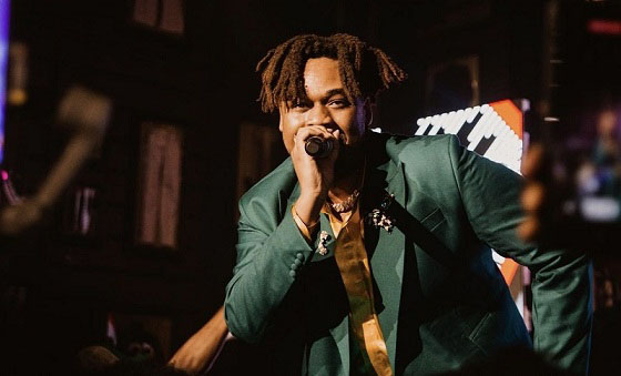 BNXN performing on stage during a Detty December concert