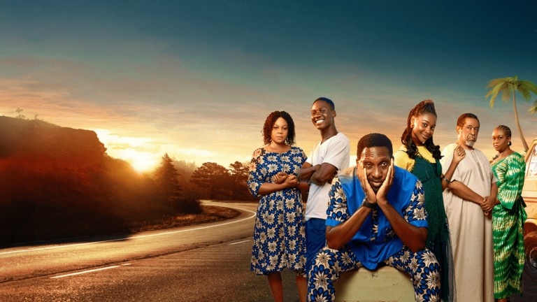 A Nigerian family watching Christmas movies together in a festive living room, representing the best Nigerian family movies to watch this holiday season